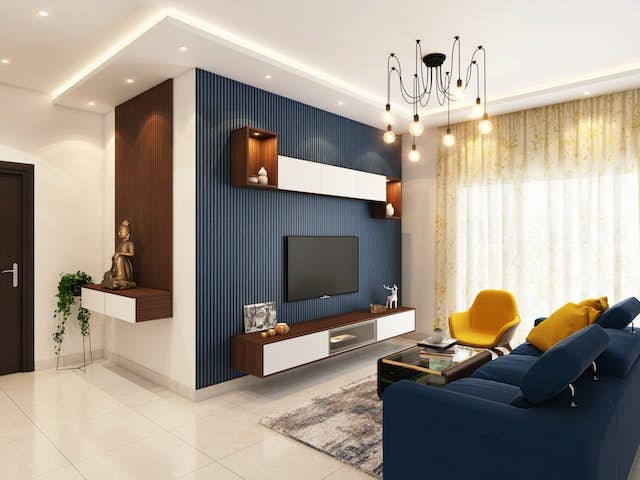Renovated living space with blue accent wall